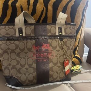 Coach vintage Signature Brown and Tan Tote with leather Coach tag.